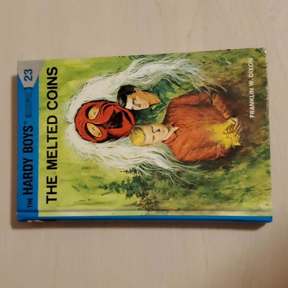 The Hardy Boys Mystery Stories 23 - The Melted Coins by Franklin W. Dixon